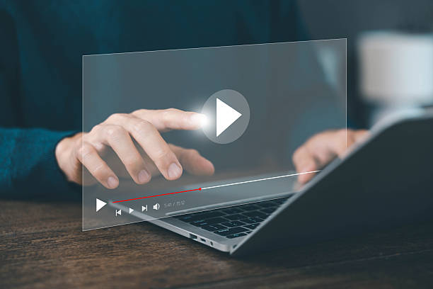 istock OTT Multimedia Watching live video streaming on your laptop computer 2210497868