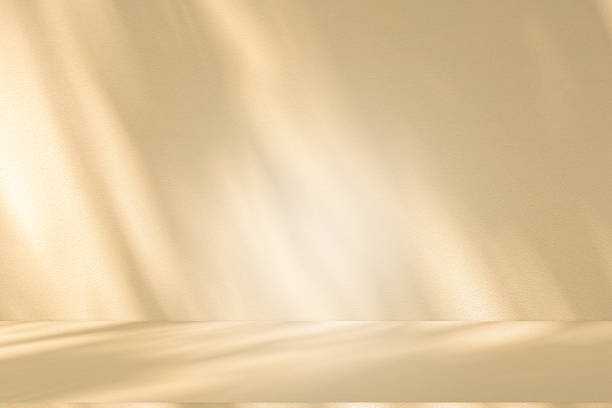 istock Studio style background wall decoration presentation uses white and beige tones. with shadows cast from a nearby window, concept creating a decorative 2210498428