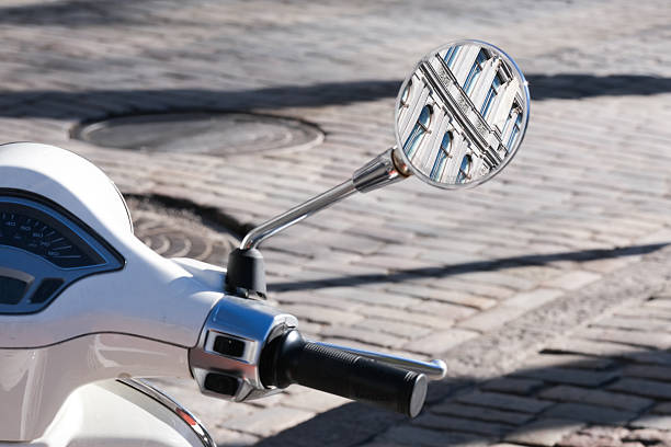 Round rear mirror on a motor bike