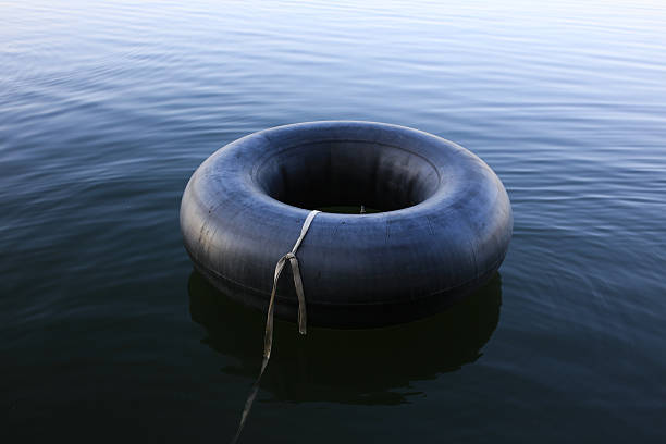 istock Tractor tire in water 2210499436
