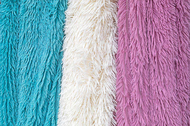 background of multicolored fluffy blankets for blankets and bedspreads