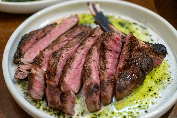 istock Medium rare angus steak served on plate 2210503637