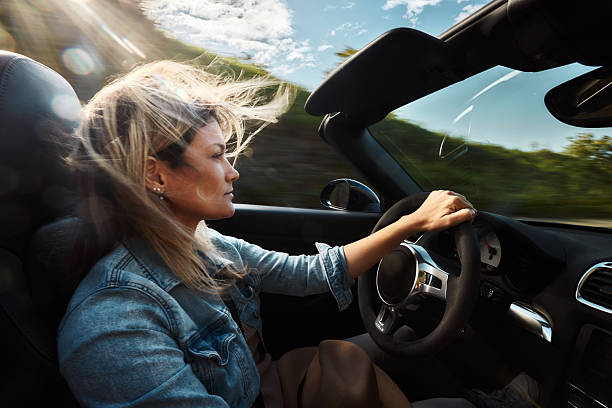 istock Driving a convertible in blurred motion! 2210506412