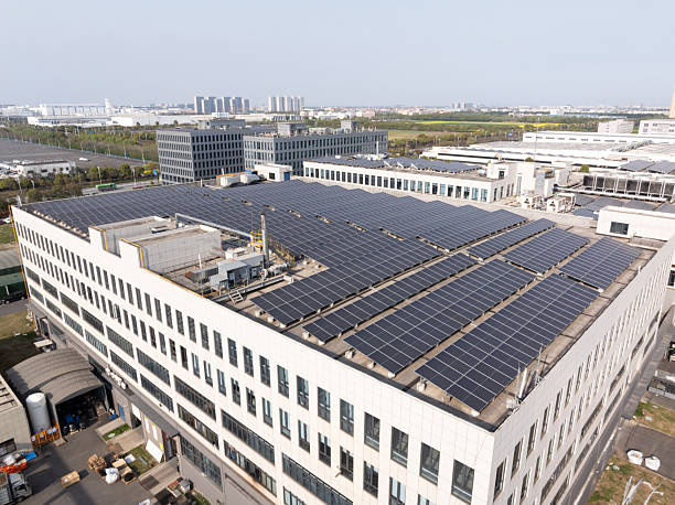 istock solar panel on rooftop of factory building 2210506438