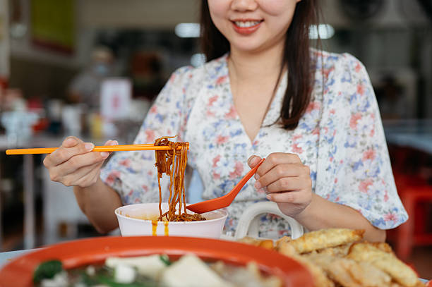 Traditional Asian Noodle Dish Served with Side Dishes