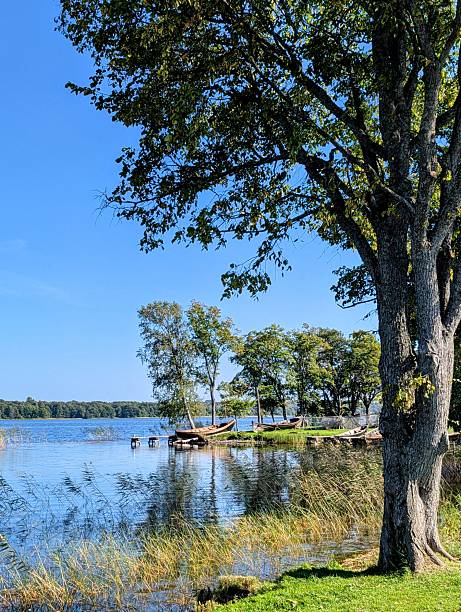 istock Moored boat on the lake shore 2210509133