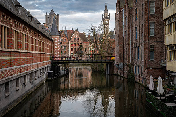 istock Scenic Ghent Canals with People Strolling Around 2210510824