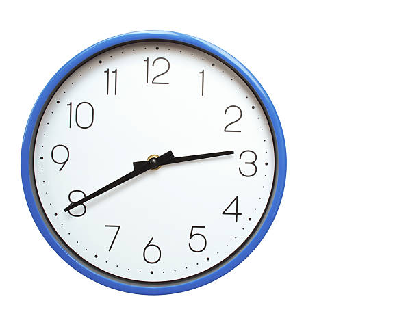 Wall clock with blue frame showing 2.40 02.40 or 14.40 O clock  on white background, suitable for time related articles, education, or punctuality concepts