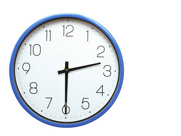 Wall clock with blue frame showing 2.30 02.30 or 14.30 O clock  on white background, suitable for time related articles, education, or punctuality concepts
