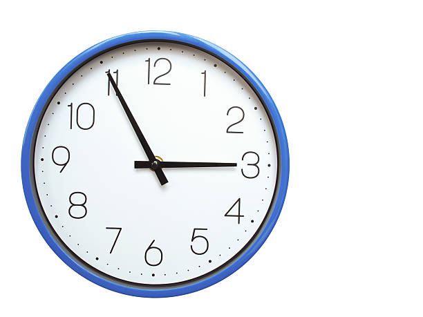 Wall clock with blue frame showing 2.55 02.55 or 14.55 O clock  on white background, suitable for time related articles, education, or punctuality concepts