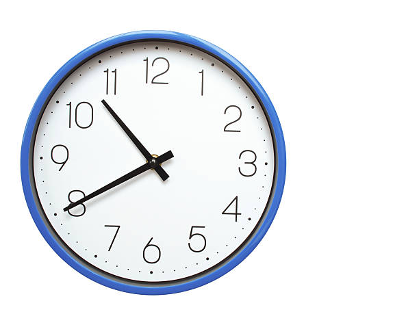 istock Wall clock with blue frame showing 10.40 10.40 or 22.40 O clock  on white background, suitable for time related articles, education, or punctuality concepts 2210517830