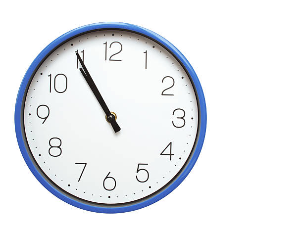 istock Wall clock with blue frame showing 10.55 10.55 or 22.55 O clock  on white background, suitable for time related articles, education, or punctuality concepts 2210517840