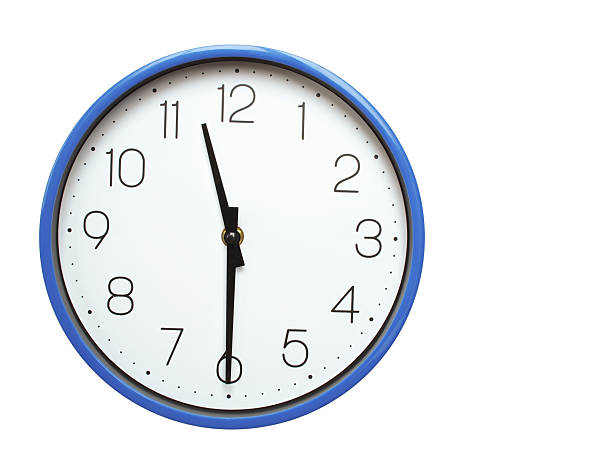 Wall clock with blue frame showing 11.30 11.30 or 23.30 O clock  on white background, suitable for time related articles, education, or punctuality concepts