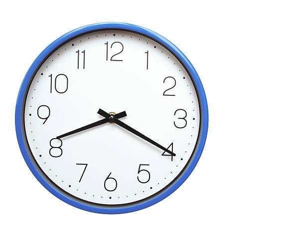 istock Wall clock with blue frame showing 8.20 08.20 or 20.20 O clock  on white background, suitable for time related articles, education, or punctuality concepts 2210517881