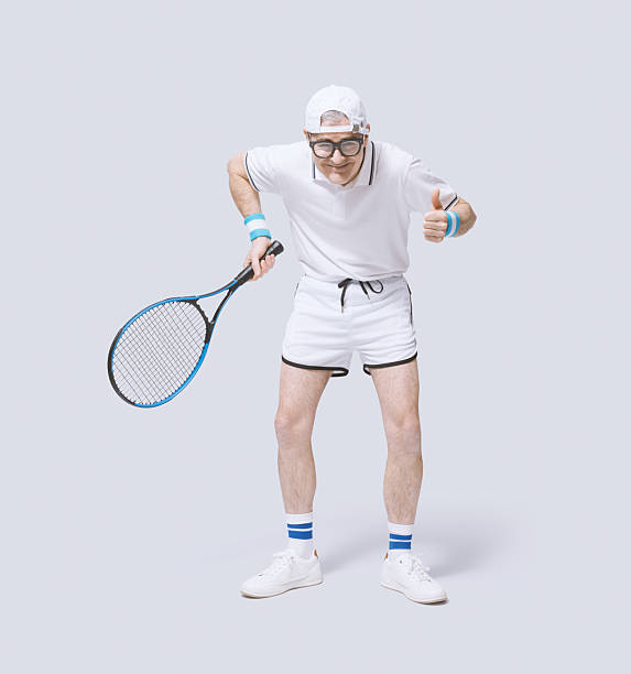 istock Funny nerdy tennis player celebrating his victory 2210518112