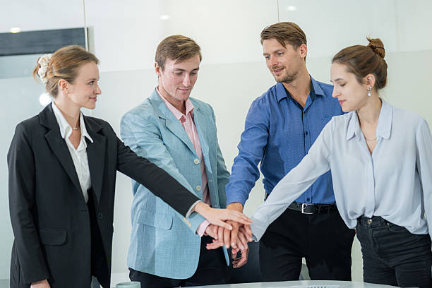 istock Team members collaborate in a modern office setting during a strategic planning session in late afternoon 2210519739
