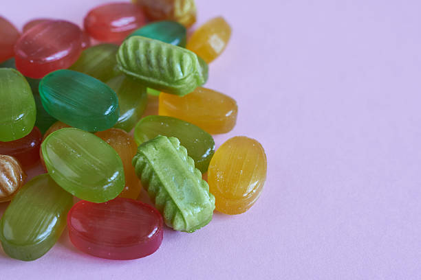istock Colorful candies on a pink background. Close-up. 2210520535