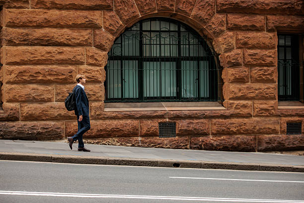 Young Businessman with Backpack Walking in Sydney