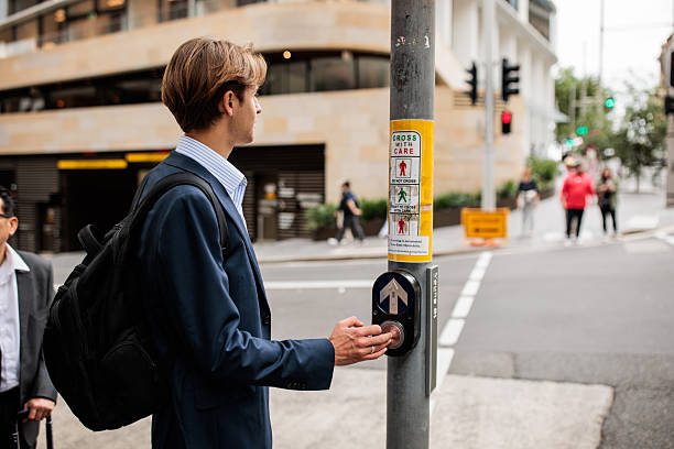 istock Businessman at Busy Intersection in Downtown Sydney 2210524739