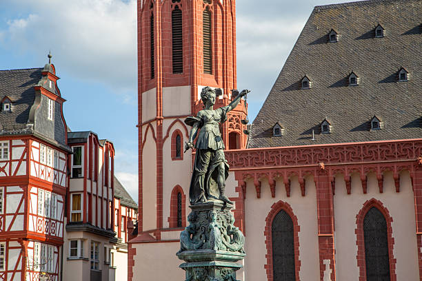 Frankfurt, Germany - August 9, 2024: Statue of Lady Justice (Justitia) in Frankfurt, Germany.