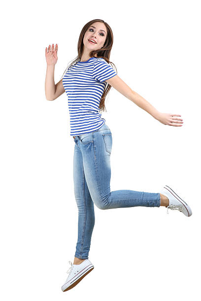 istock Jumping beautiful girl on white background 2210527820