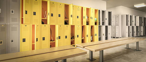istock School lockers and benches in a changing room 2210529758