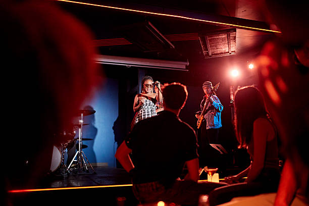 istock Audience view of Black chanteuse performing with jazz band 2210532798