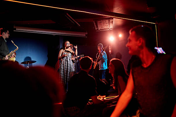 istock Five-member jazz band performing at nightclub 2210533995