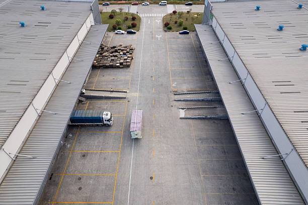 istock Logistics warehouses and trucks 2210534636