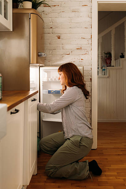 istock Young woman serching for food 2210535181