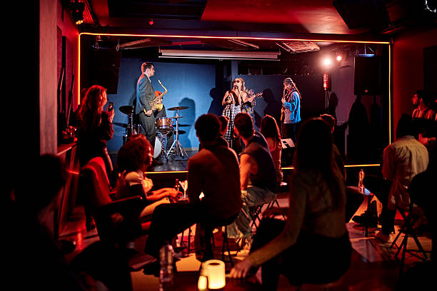 istock Chanteuse and jazz band onstage at nightclub 2210535467
