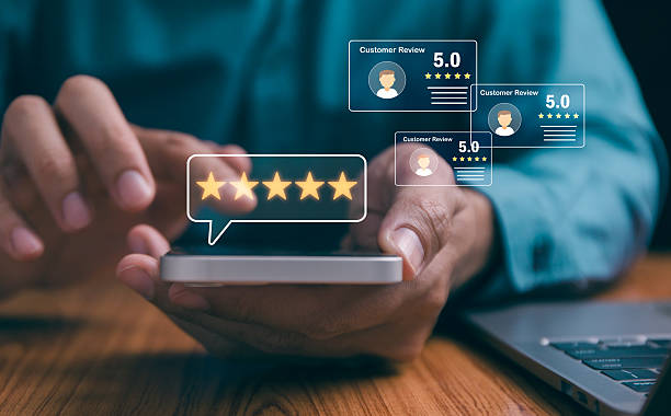 istock User give rating to service excellent experience on mobile phone application, Client evaluate quality of service reputation ranking of business. Customer review satisfaction feedback survey concept. 2210546393