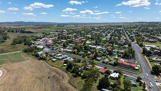 istock Aerial view of a small rural town and fields. 2210546418