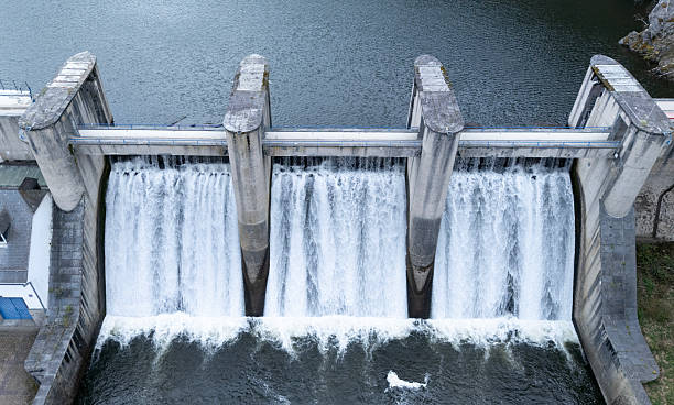 istock Drone view of a river dam site in Belgium 2210554052
