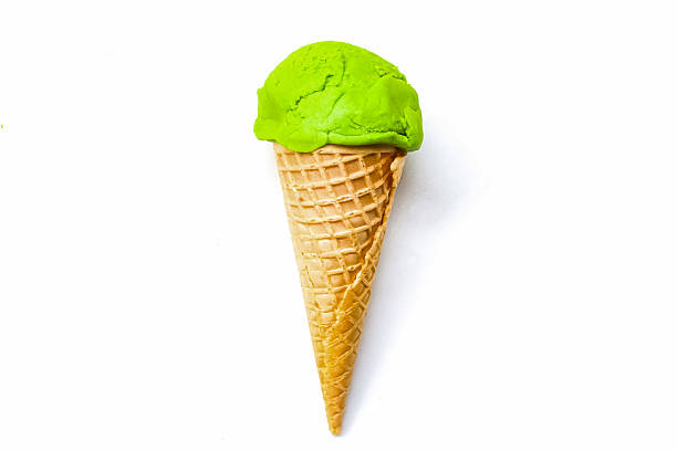 istock green ice cream cone isolated on white background 2210554363
