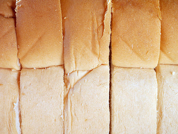 Fresh brown bread Top view, texture of fragrant bread background with brown bread edges macro food