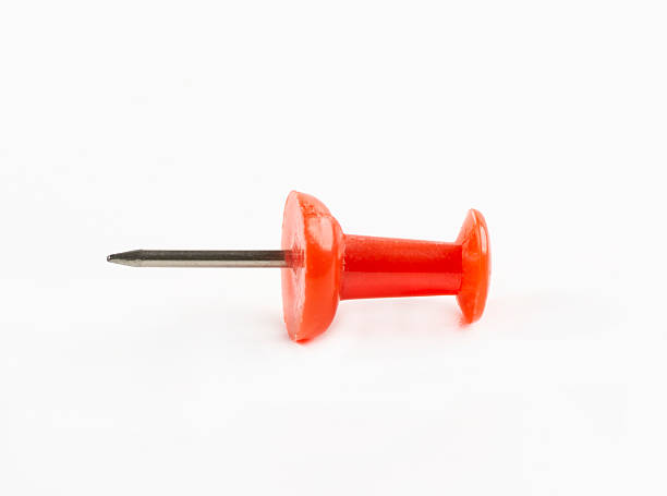 istock On a white background there is a red pushpin. Isolated 2210562467