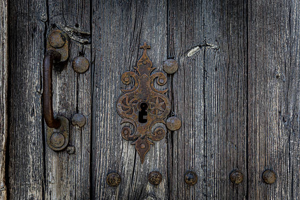 istock Rustic Wooden Door with Ornate Lock 2210563825