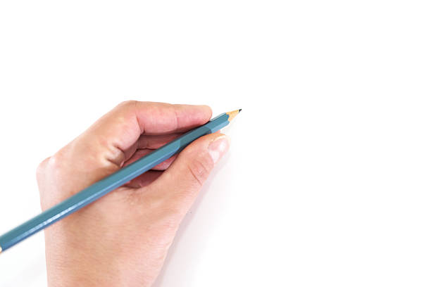 istock Hand with a pencil on a white background. Body parts. Copy space 2210564188