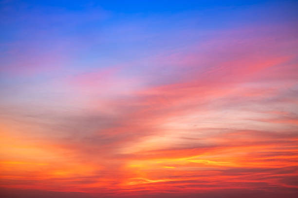 istock Beautiful , luxury soft gradient orange gold clouds and sunlight on the blue sky perfect for the background, take in evening,Twilight, Large size, high definition landscape photo 2210566746