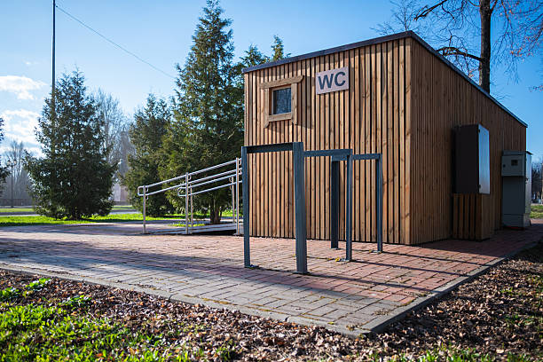 istock Wooden Restroom Building 2210567377