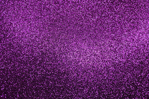 istock Abstract magenta violet purple glitter texture background 2210569100