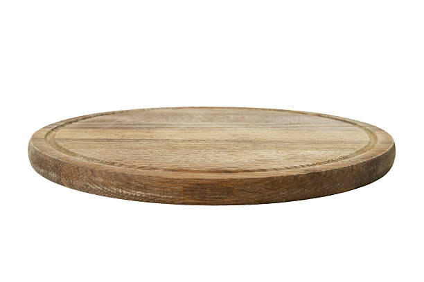 istock Wooden round board. Pizza board isolated on white background 2210569976
