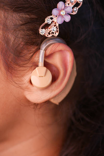 Hearing aid concept, little girl with hearing problems