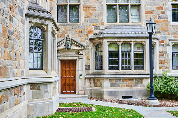 istock Classic University Building Facade with Stonework and Arched Entrance 2210570771