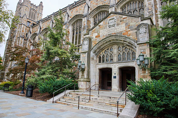 istock Gothic University Entrance with Lush Greenery, Eye-Level View 2210570910