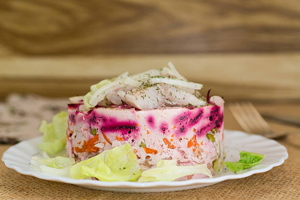 Festive layered salad with herring, beetroot and mayonnaise.