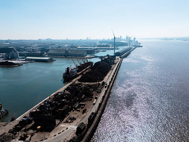 Aerial view of a cargo ship being loaded with scrap metal at the port of liverpool