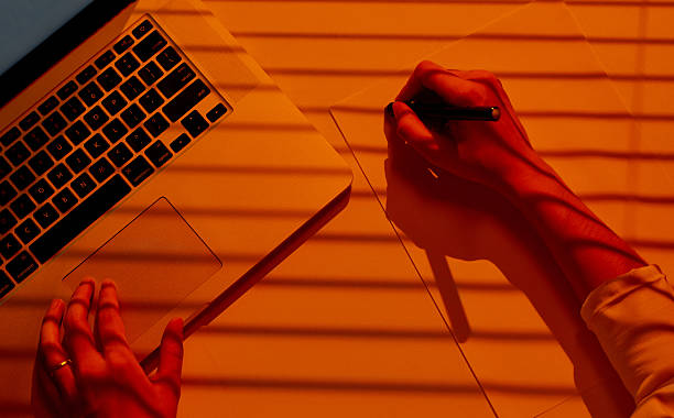 istock Creative Female Hands Drawing with Pen Beside Laptop. 2210574623
