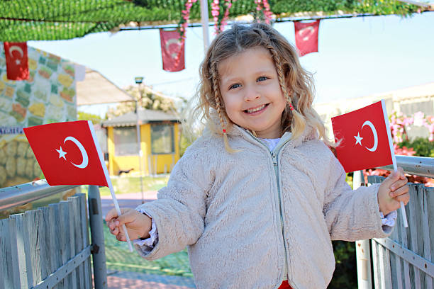 istock Girl carrying Turkish flag 2210577946